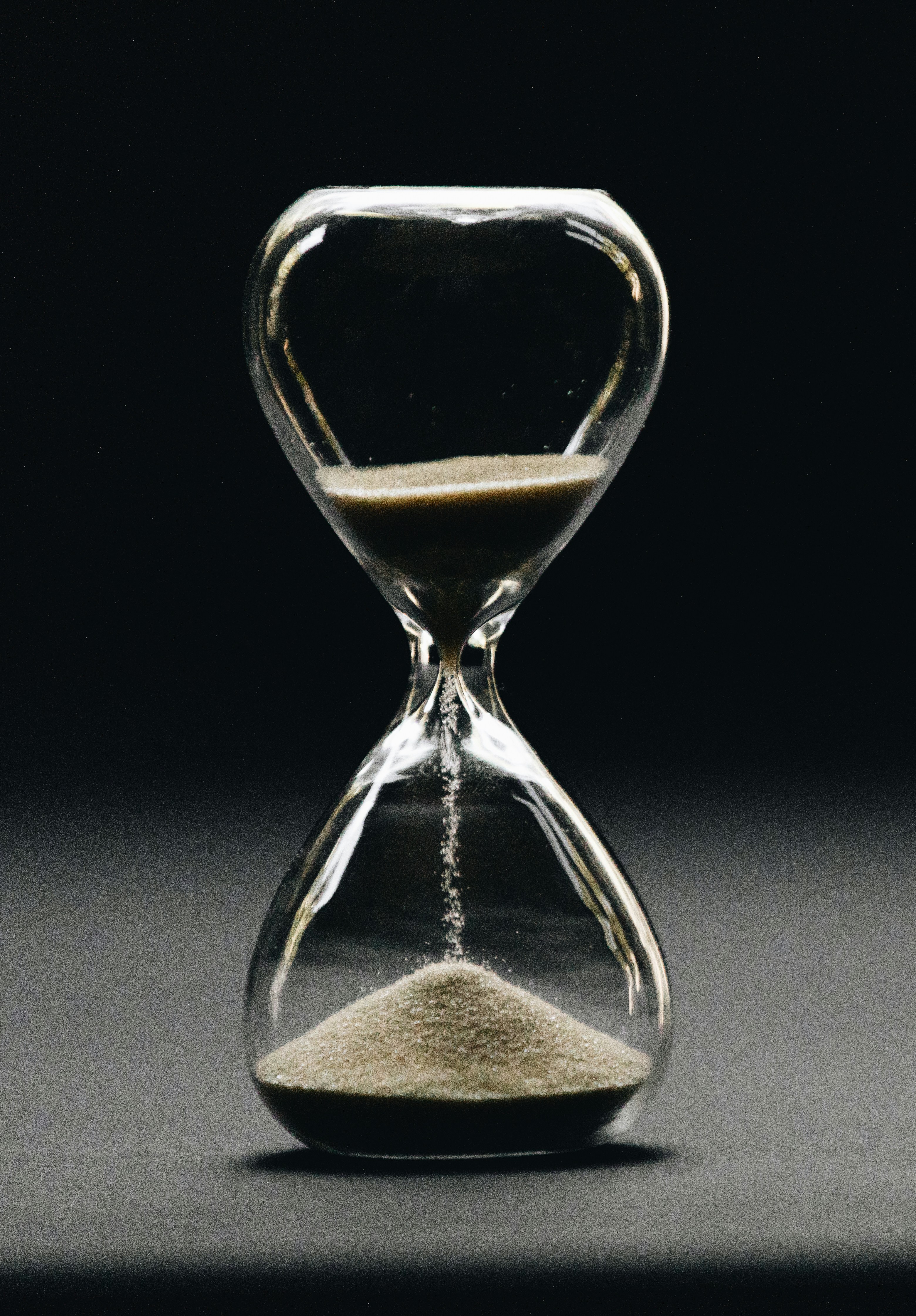 An hourglass, representing time and clarity